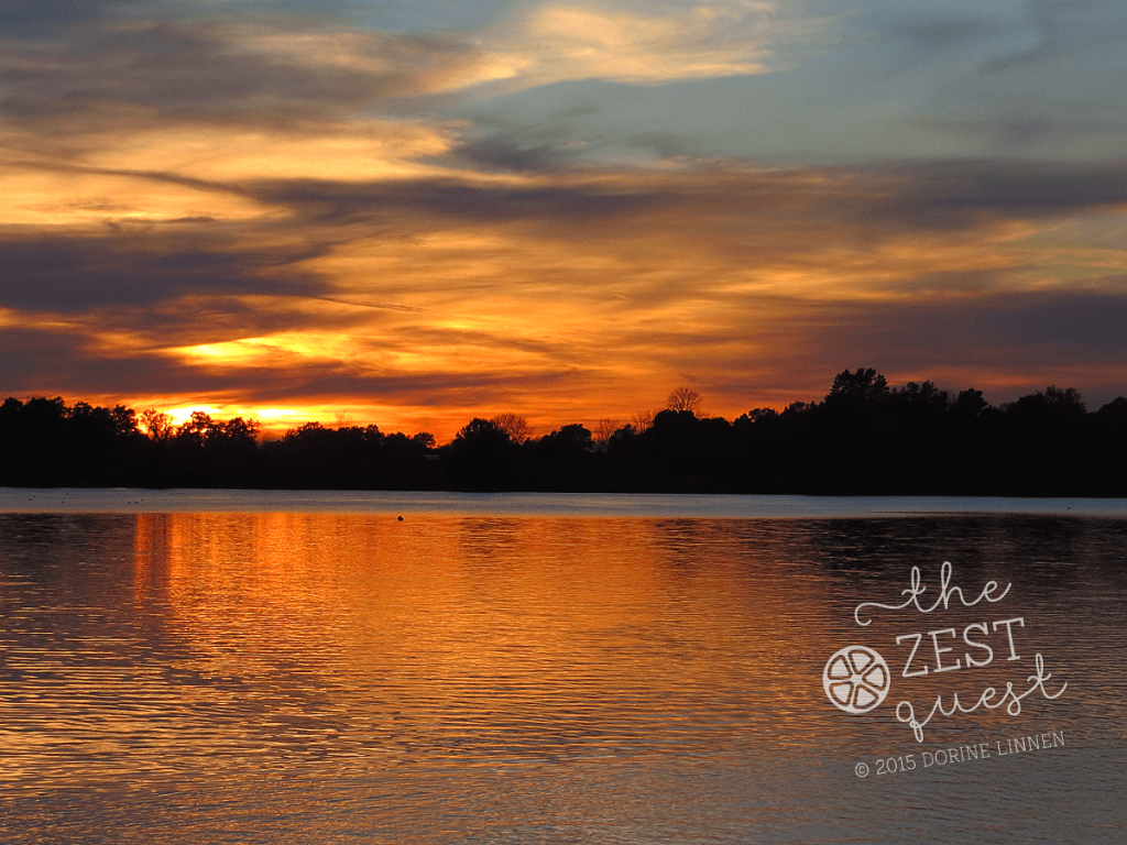 Sunset-at-Springfield-Lake-Ohio-glitters-like-gold-under-cloud-cover-2-The-Zest-Quest